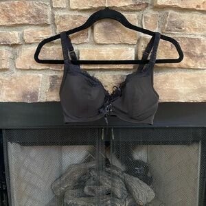 Fredericks of Hollywood padded black bra with lace, satin tie in the middle.34D